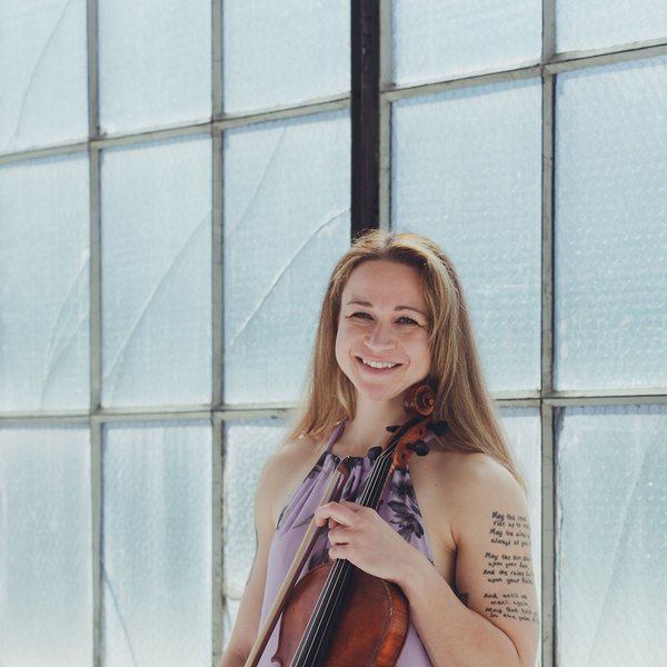 Kat holding her viola